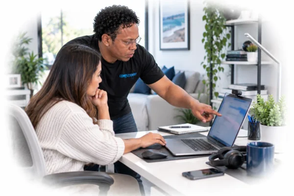 Technician setting up software for a remote worker