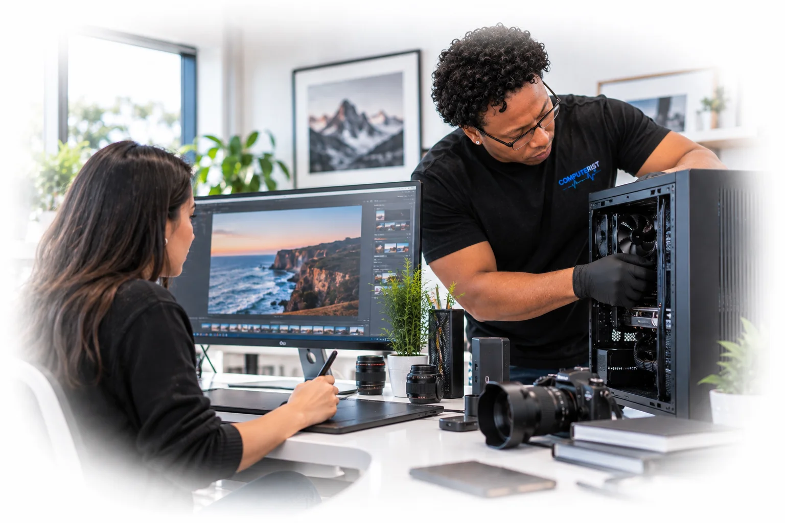 Computer technician optimising a professional creative workstation. 